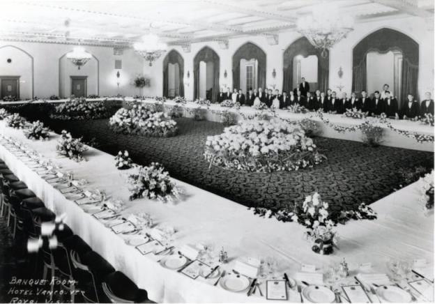 Hotel Vancouver silverware is can be seen in this 1939 photo of a banquet room and staff.