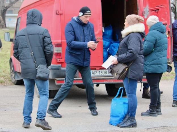 Food baskets from the United Nation's World Food Program are delivered to residents who fled Russian-occupied Ukraine in Zaporizhzhia.